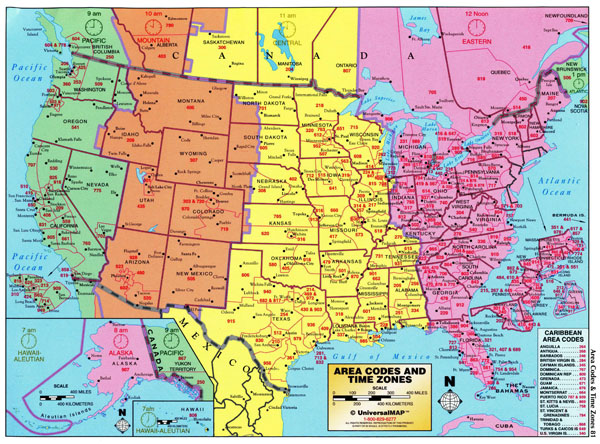 Large detailed map of area codes and time zones of the USA.